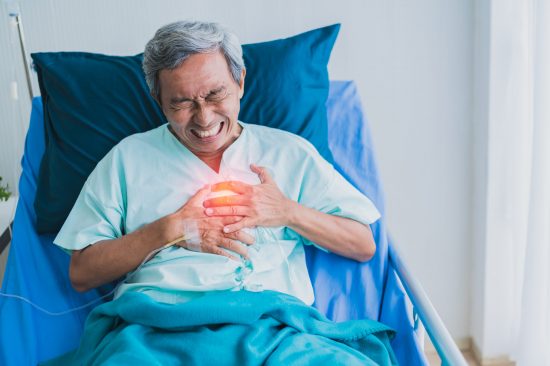 pain and heartburn old senior asian grandfather in patient unifo pain and heartburn old senior asian grandfather in patient uniform suffer from body problem health ideas concept